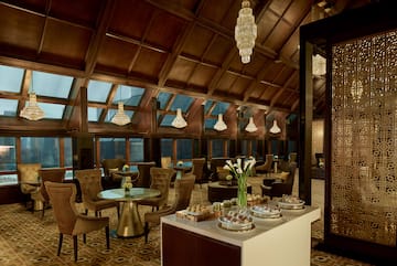 a room with a table and chairs