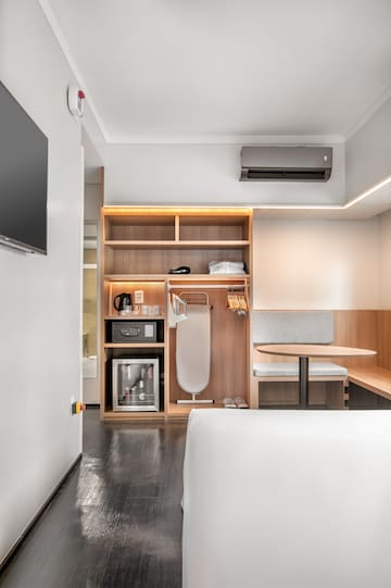 a room with a bed and a table