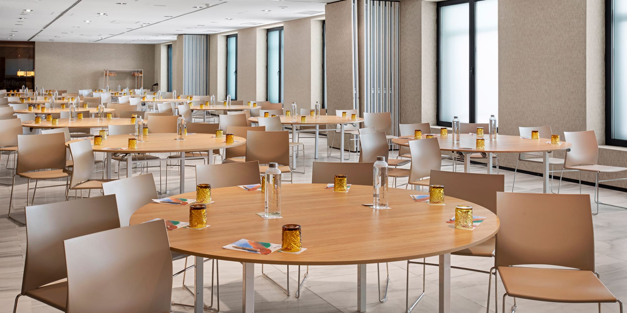 a room with tables and chairs