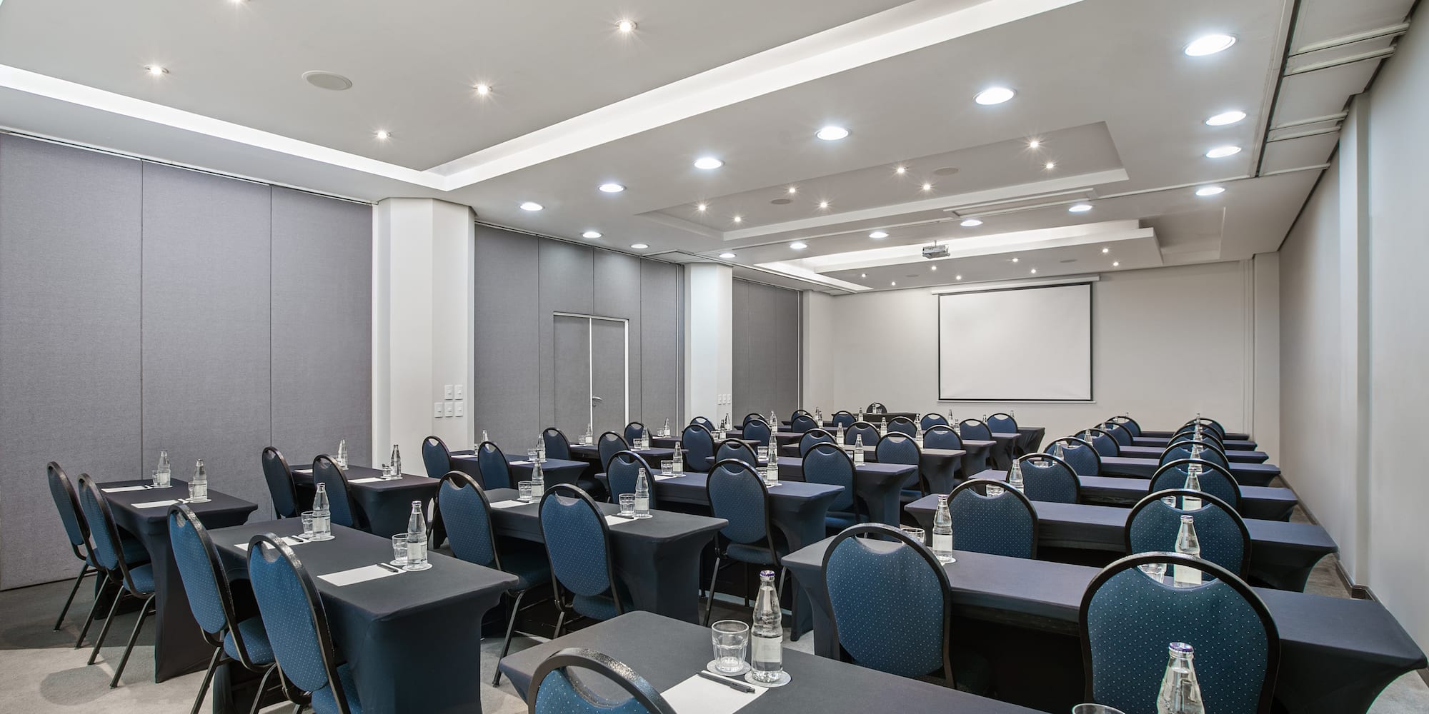 a room with tables and chairs