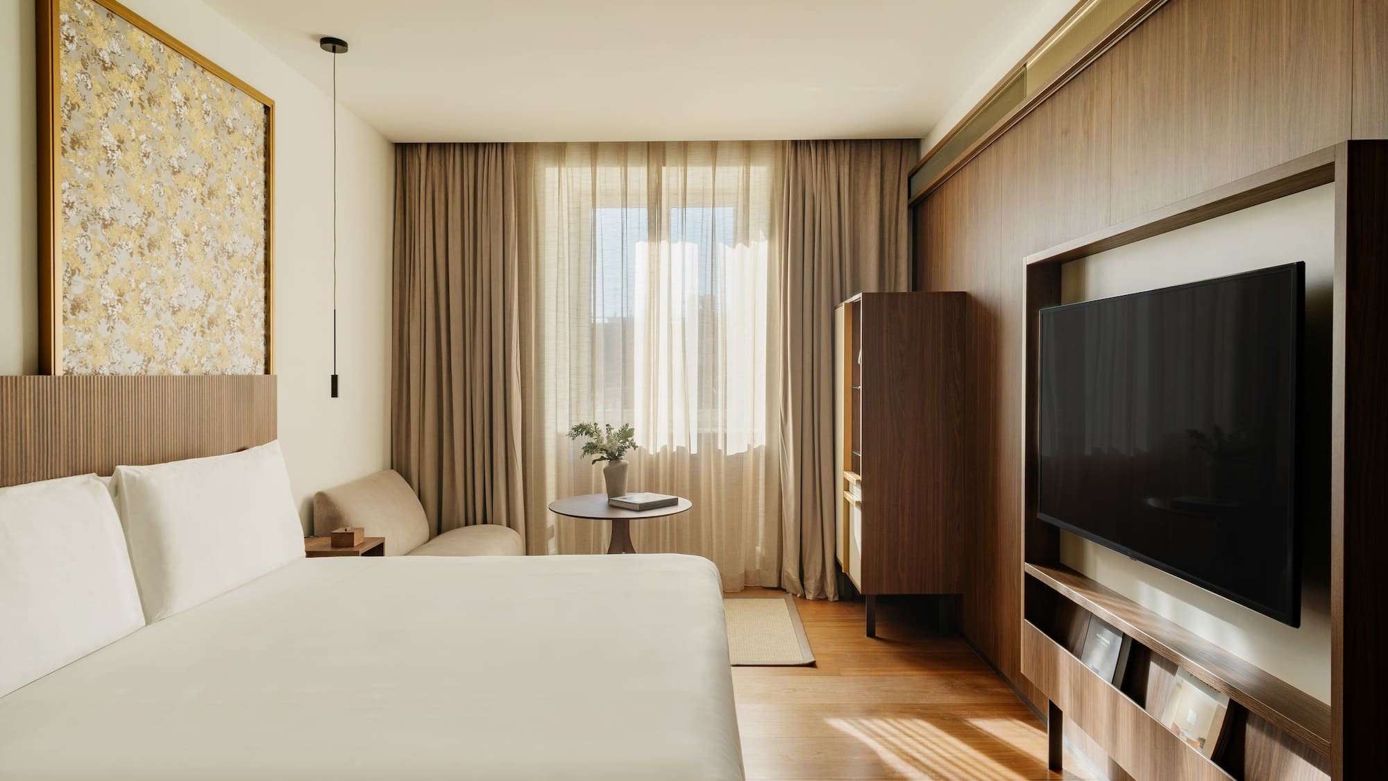 Premier room with a twin bed and a television