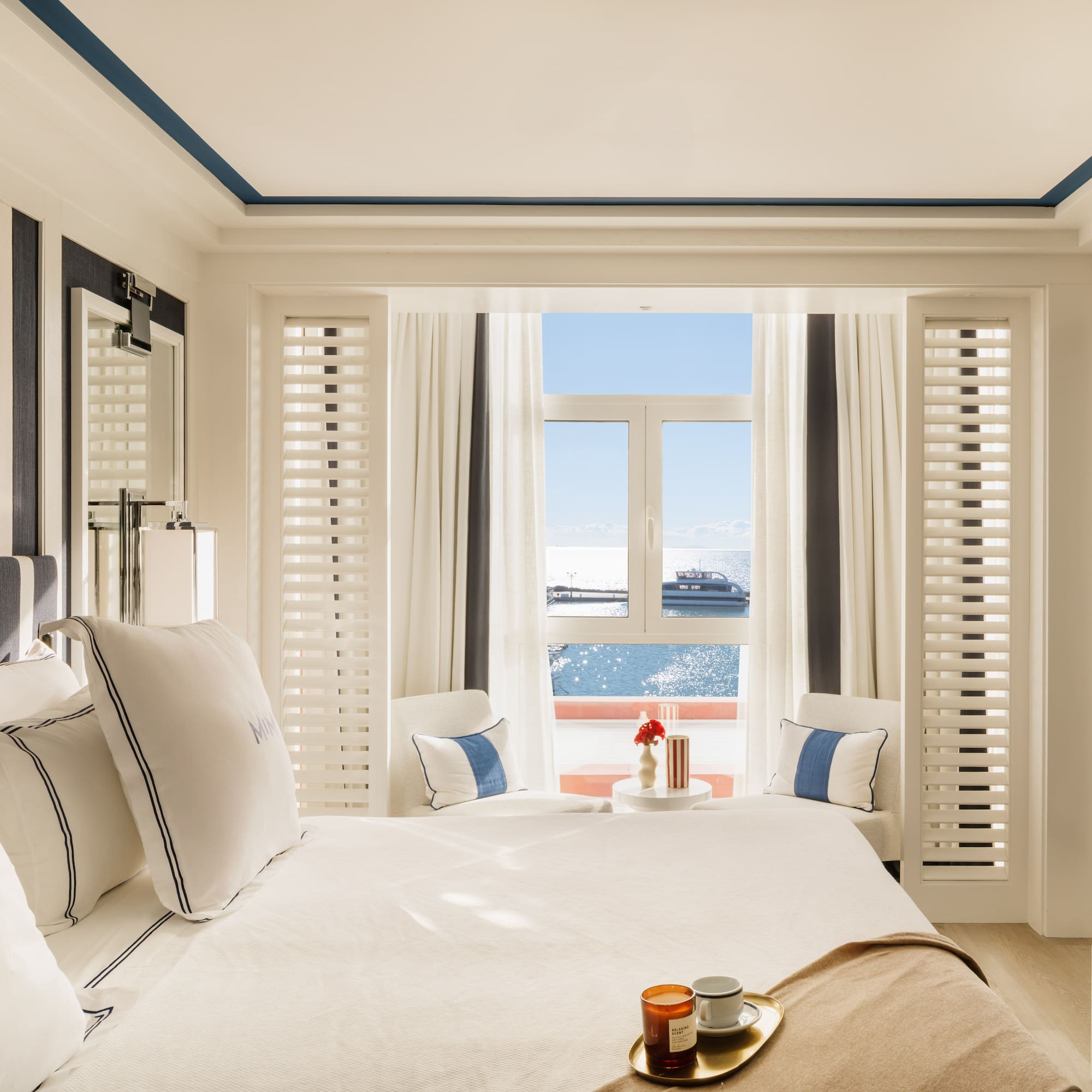 a room with a bed and a window