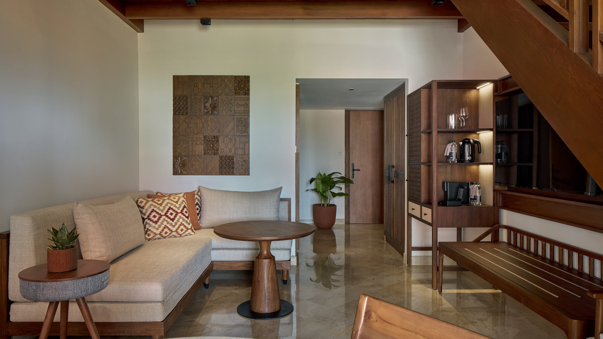 a living room with a couch and a table