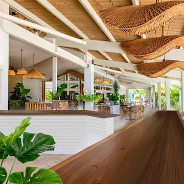 a long wooden table in a building