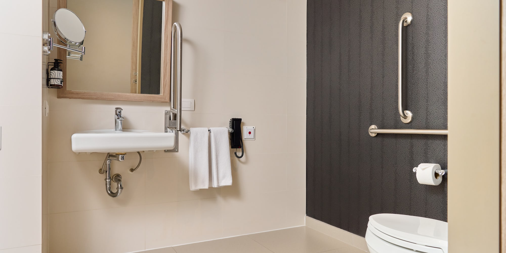a bathroom with a sink and mirror