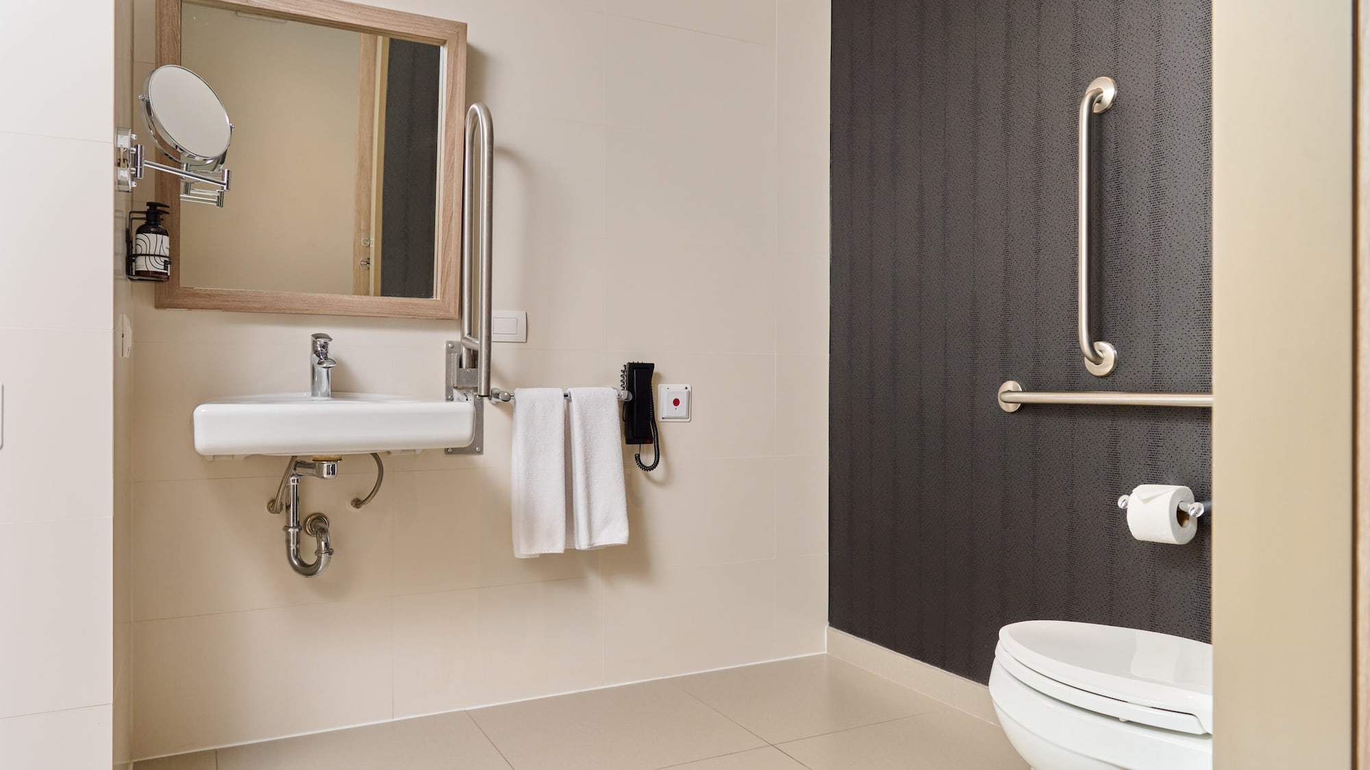 a bathroom with a sink and mirror