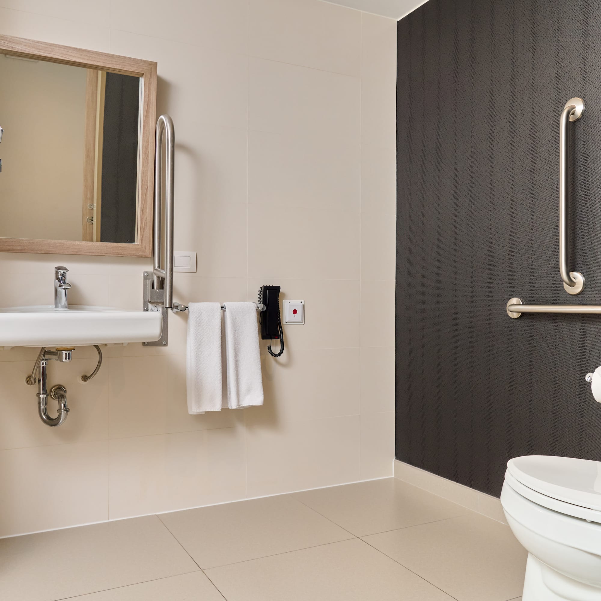 a bathroom with a sink and mirror