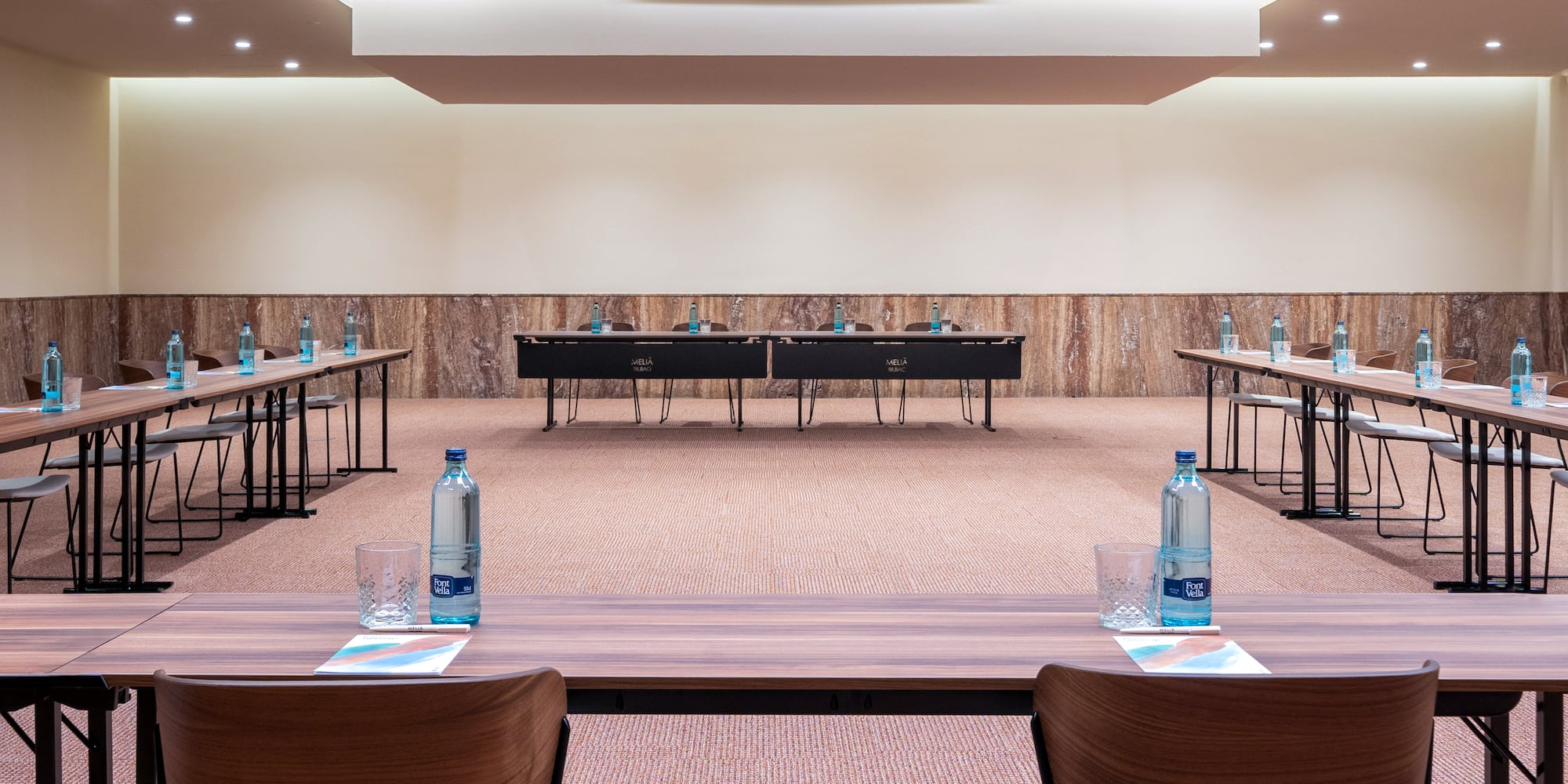 a room with tables and chairs