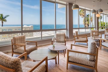 a room with chairs and a table