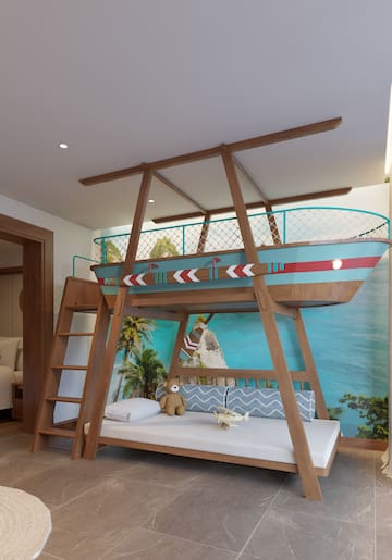 a bunk bed with a boat on it