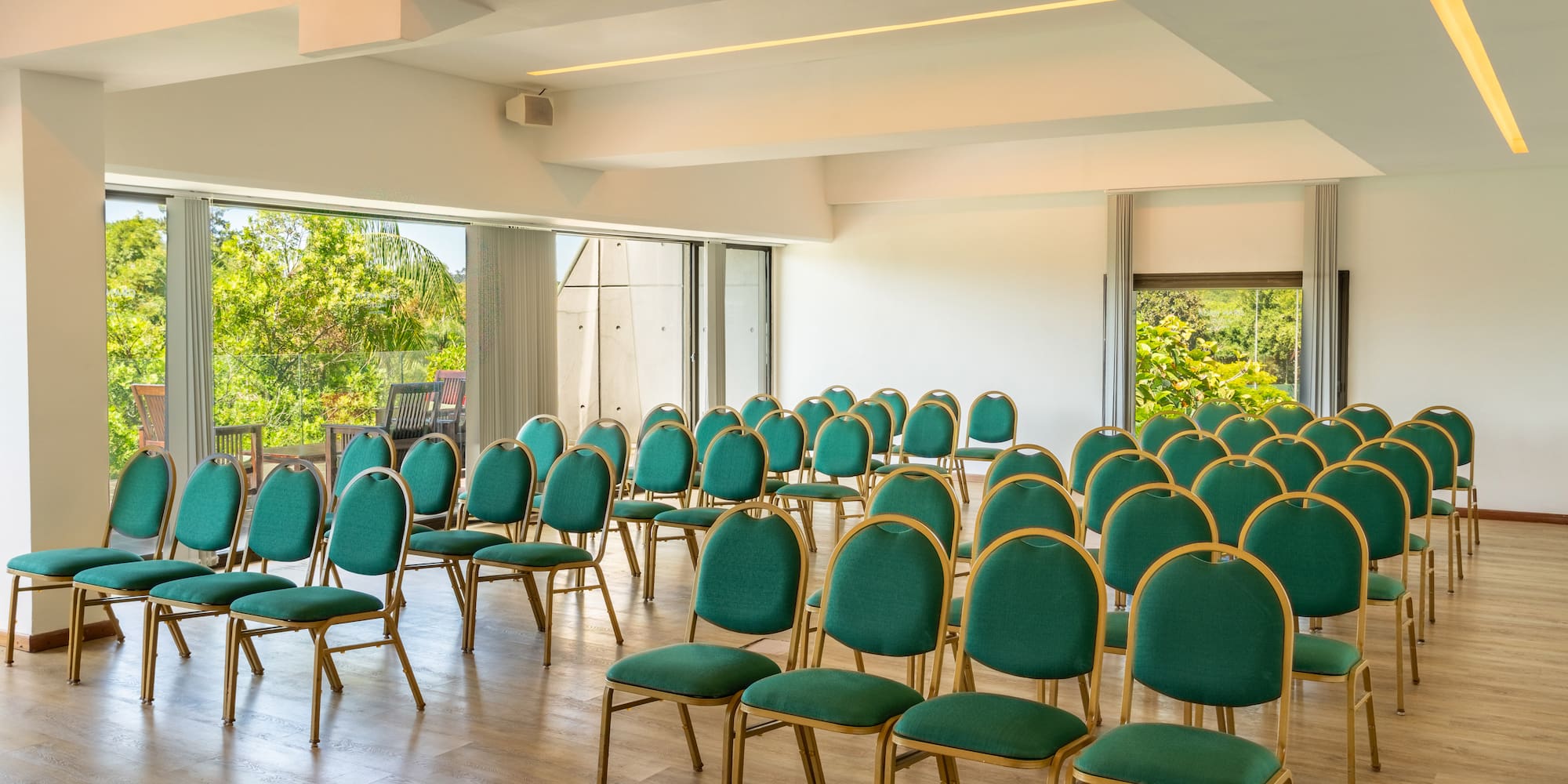 a room with green chairs