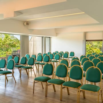 a room with green chairs