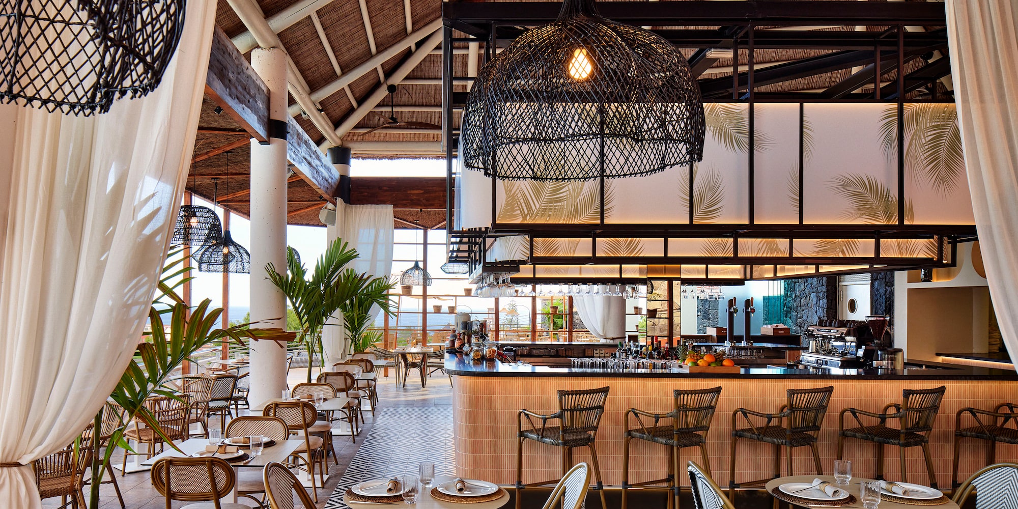 a restaurant with tables and chairs