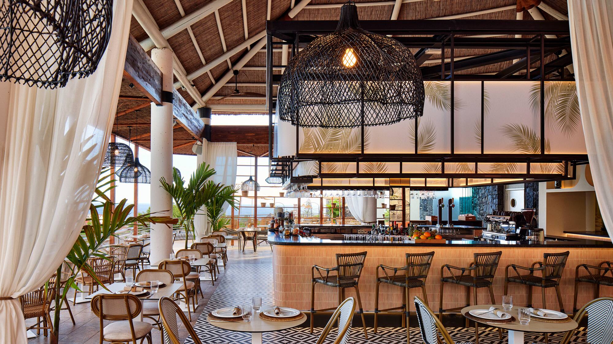 a restaurant with tables and chairs