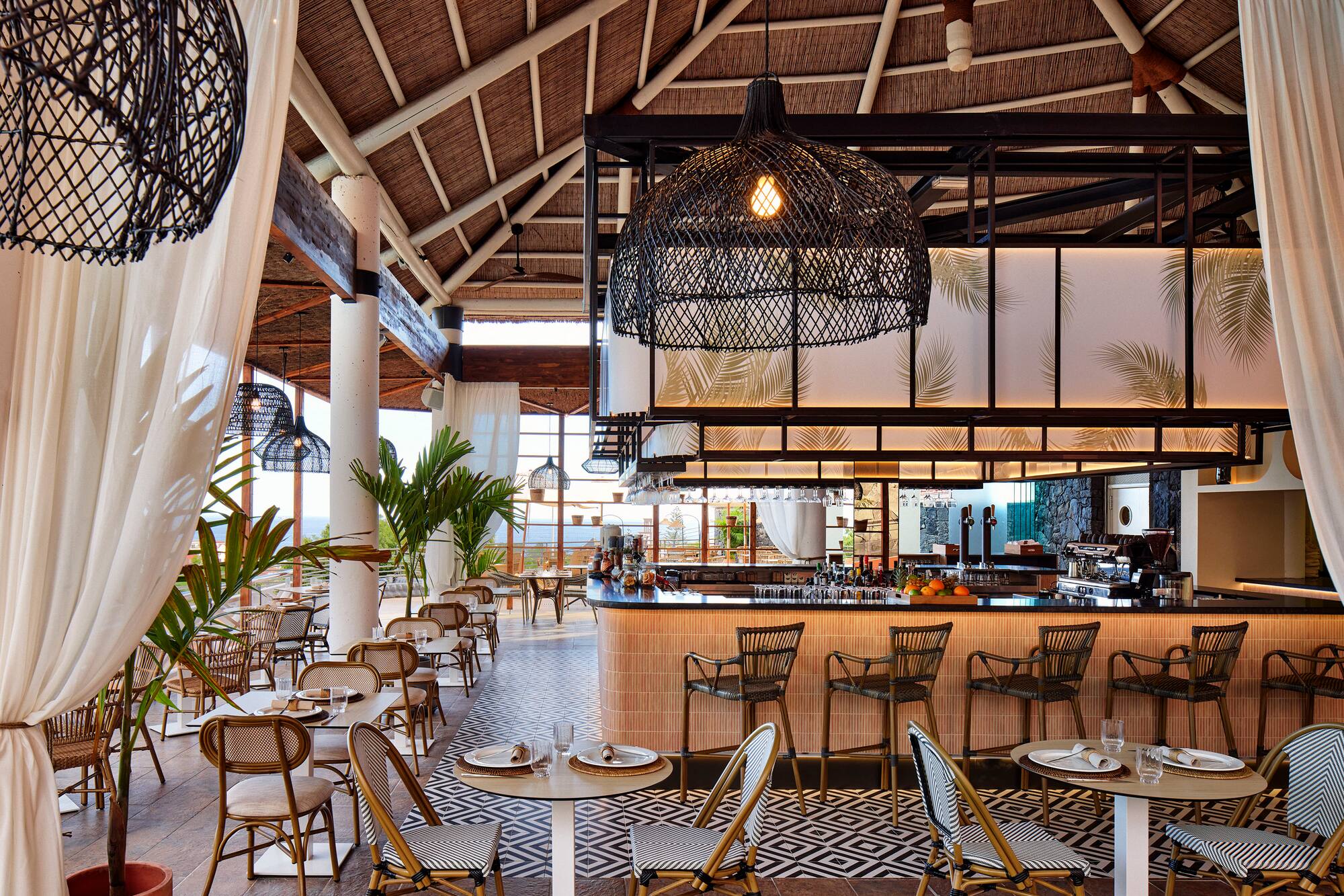 a restaurant with tables and chairs