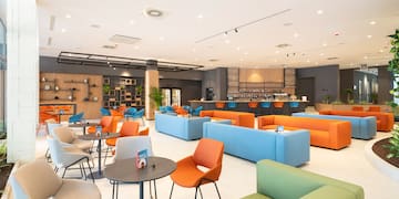 a room with tables and chairs