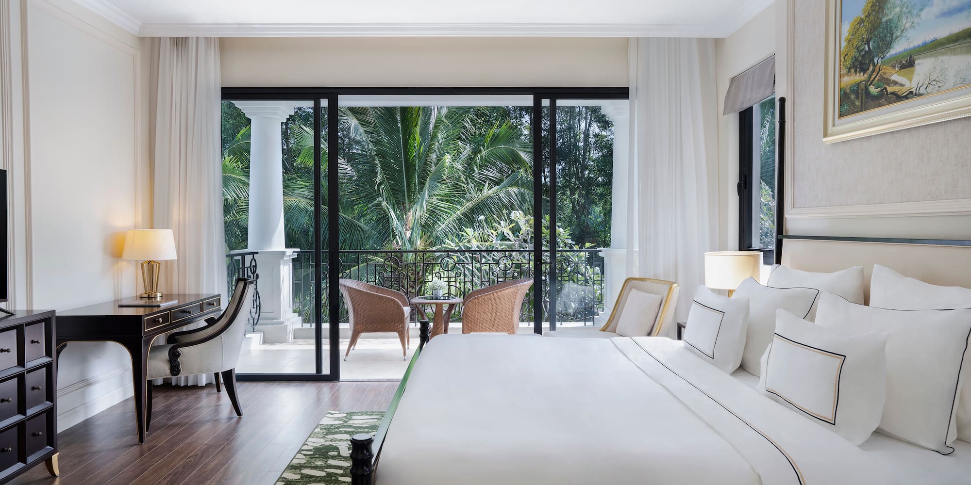 a bedroom with a large glass door