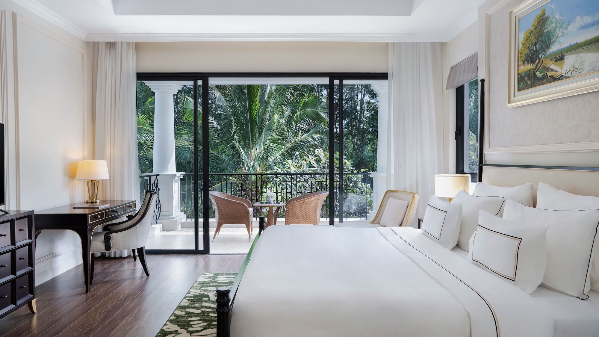 a bedroom with a large glass door