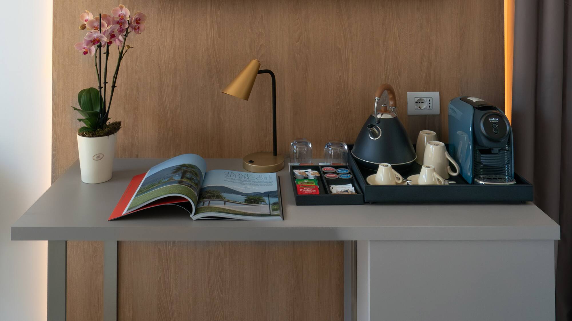 a table with a tray of tea and coffee on it