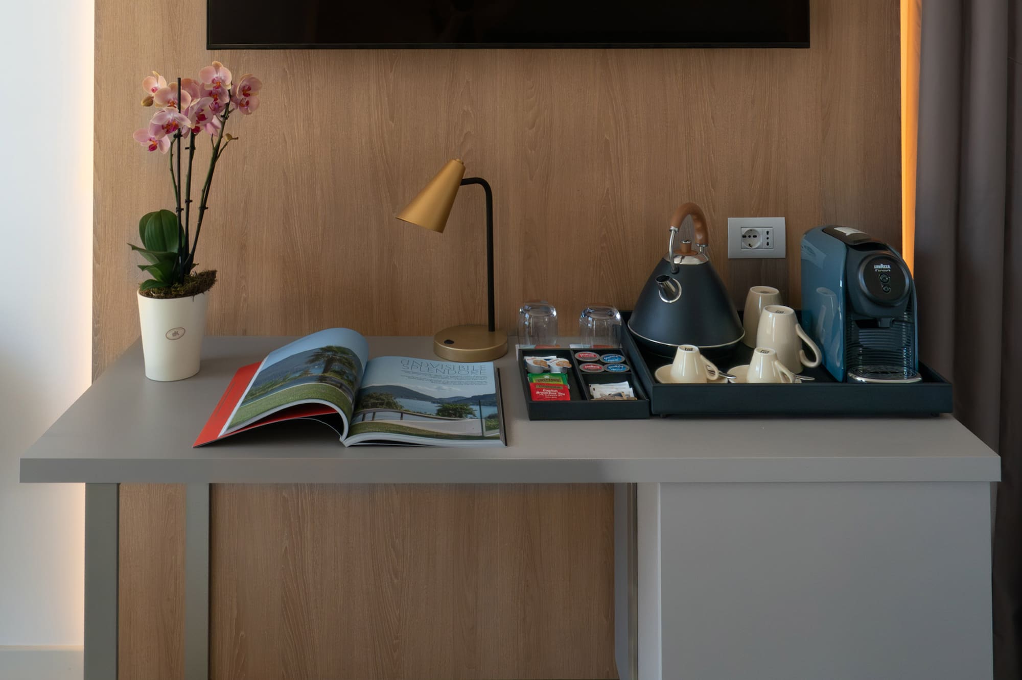 a table with a tray of tea and coffee on it