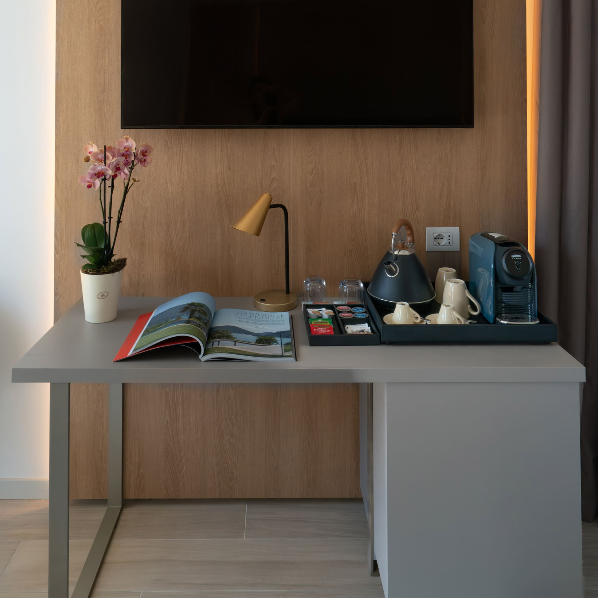 a table with a tray of tea and coffee on it