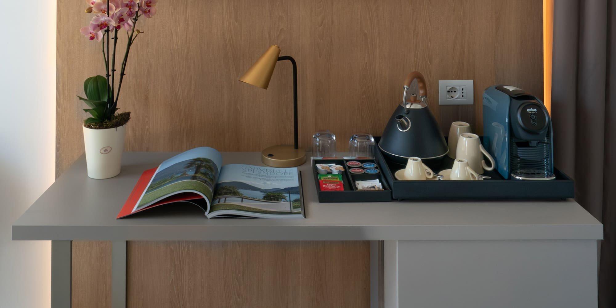 a table with a tray of tea and coffee on it