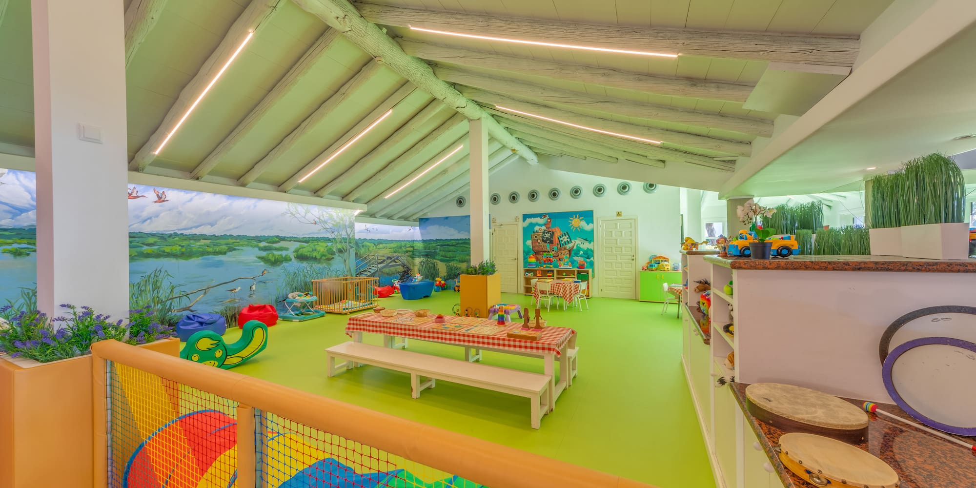 a room with a large table and chairs