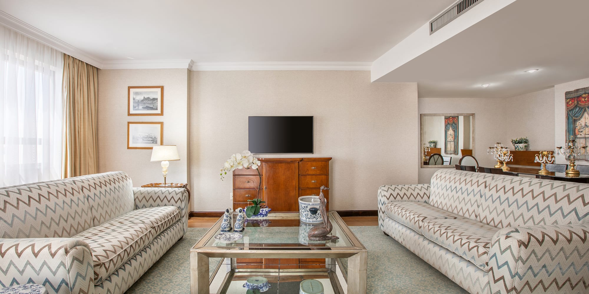 a living room with couches and a coffee table