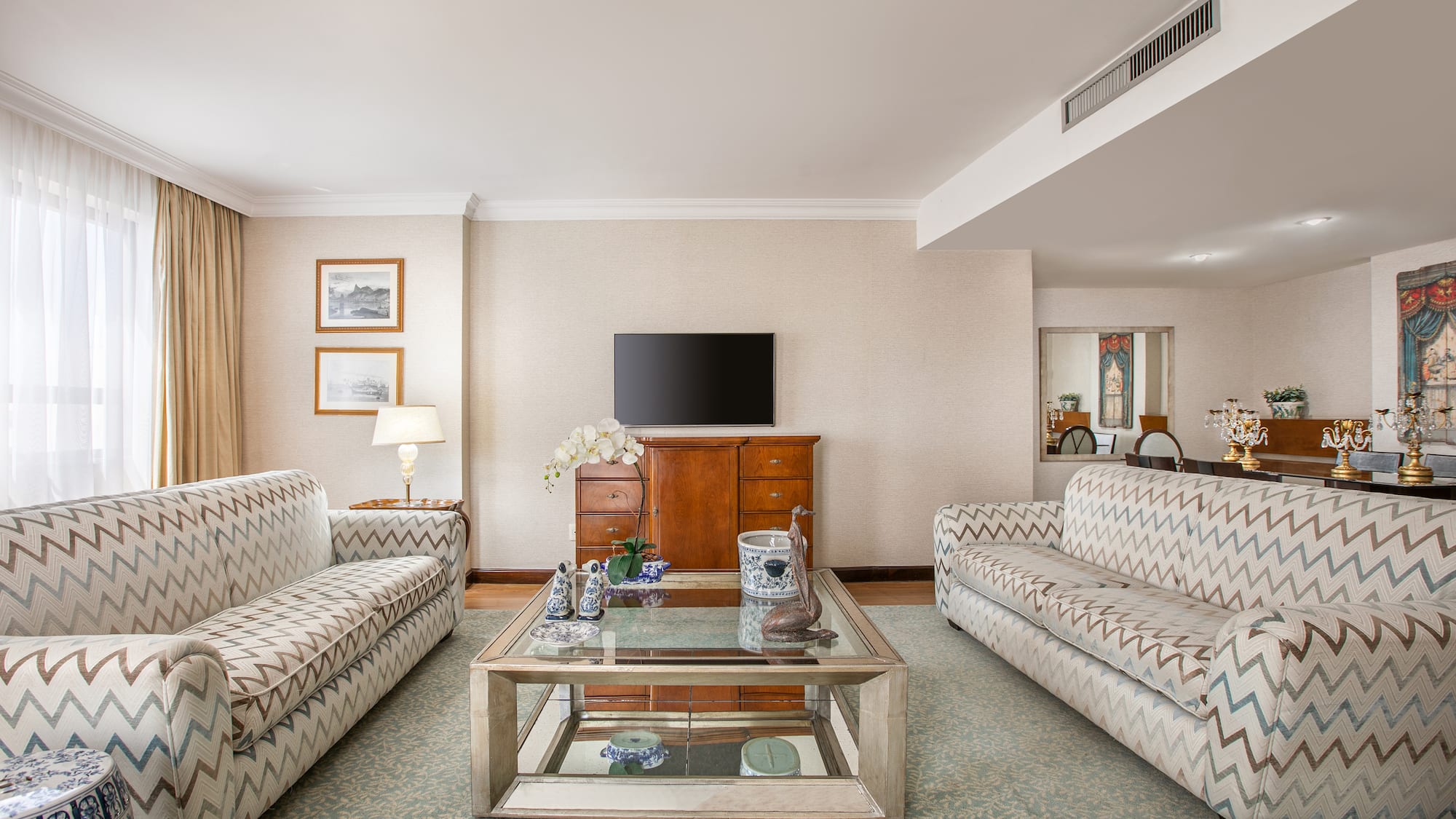 a living room with couches and a coffee table