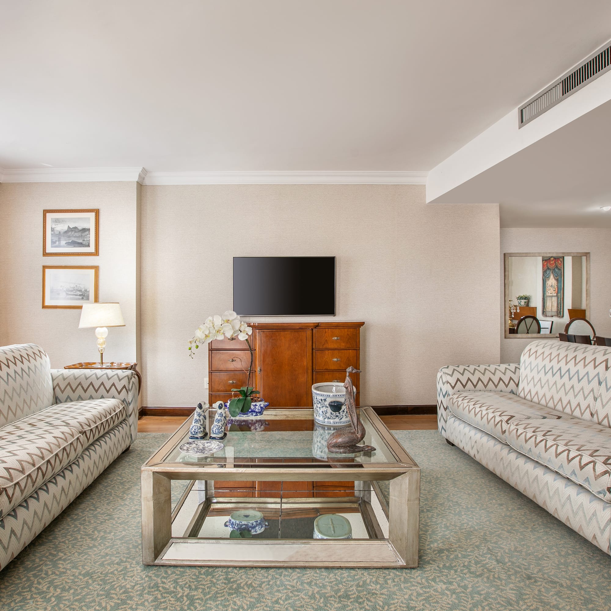 a living room with couches and a coffee table