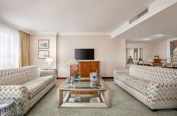 a living room with couches and a coffee table