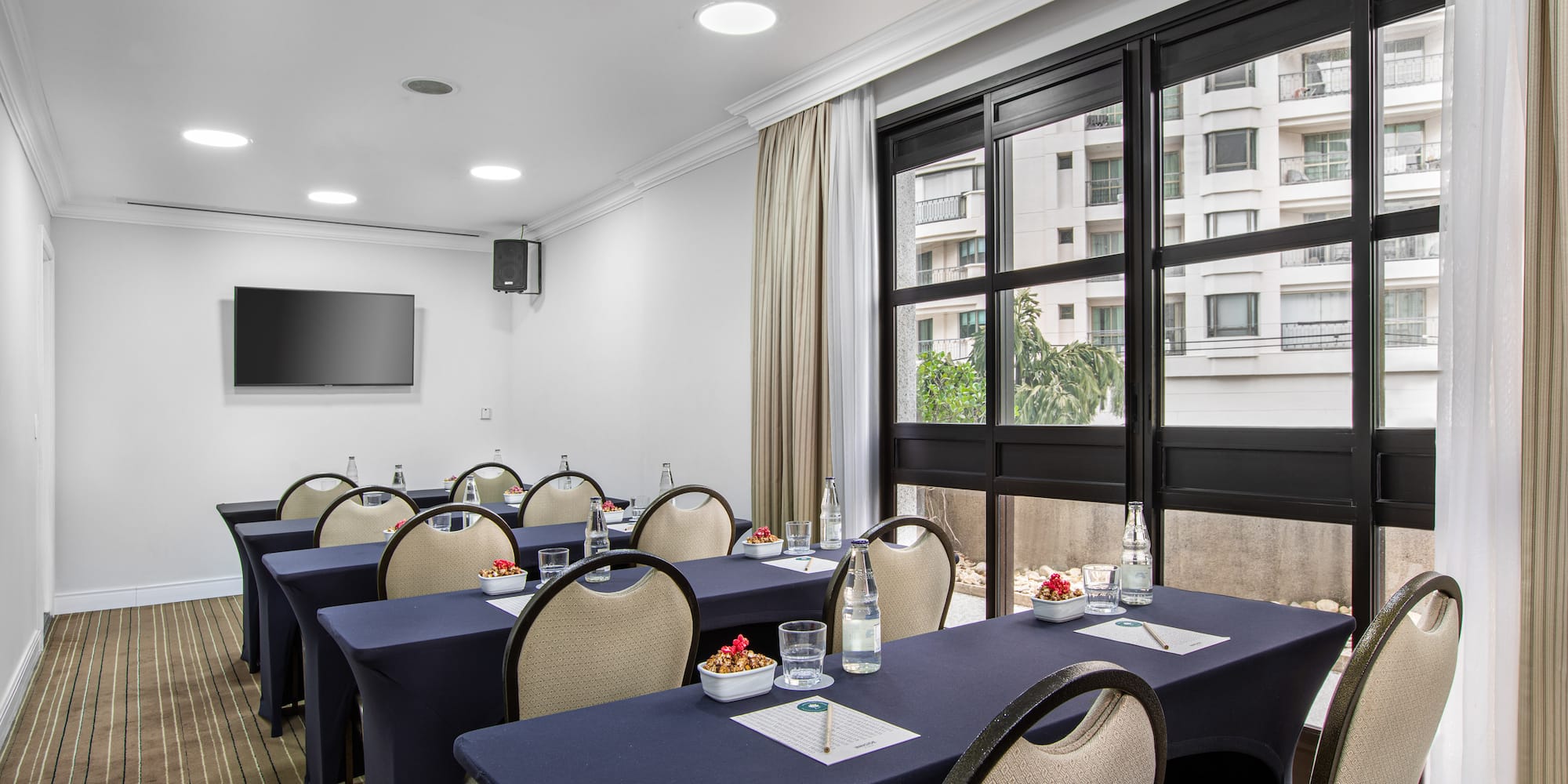 a room with tables and chairs