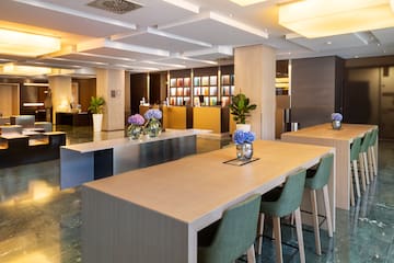 a room with a table and chairs