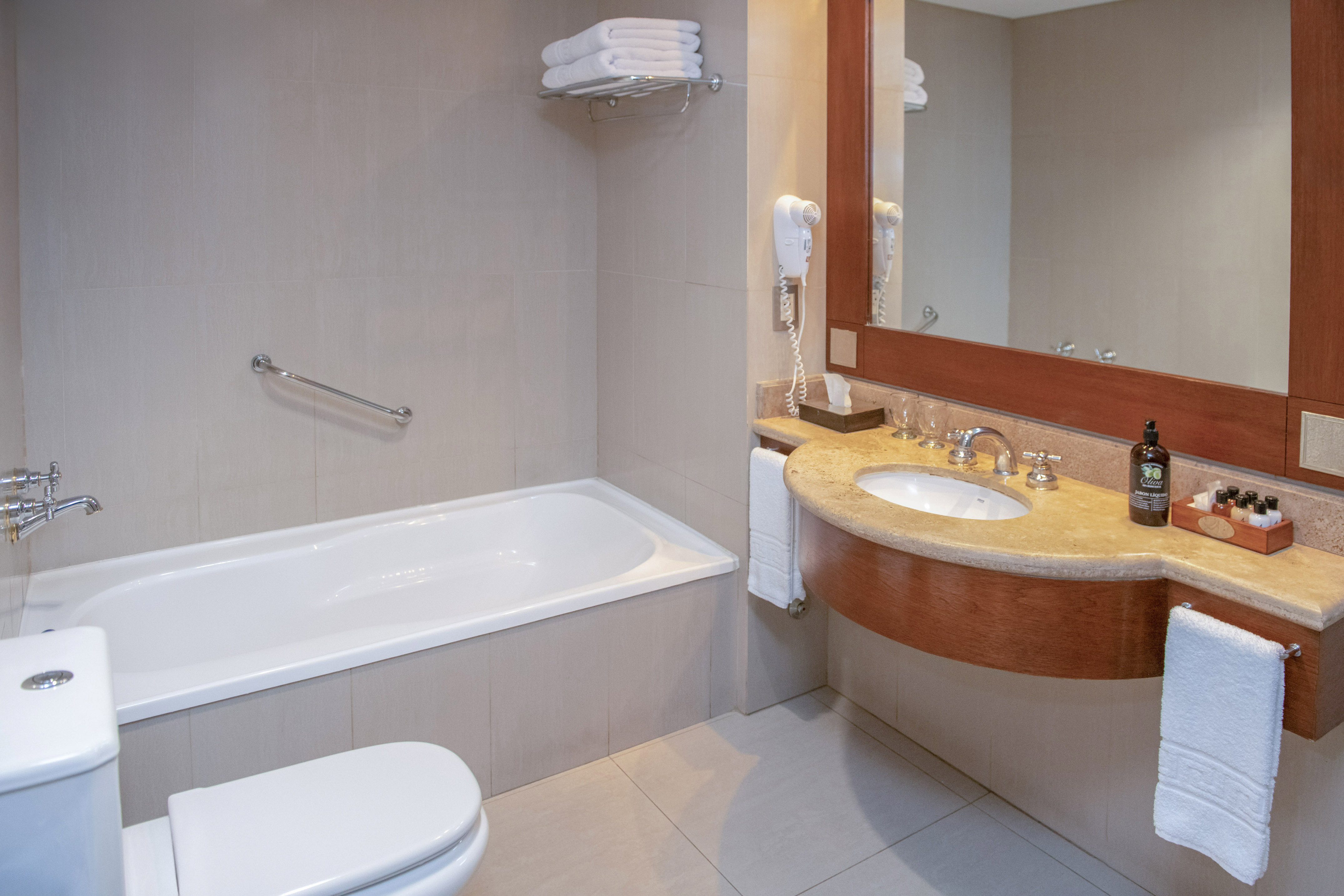 a bathroom with a sink toilet and bathtub