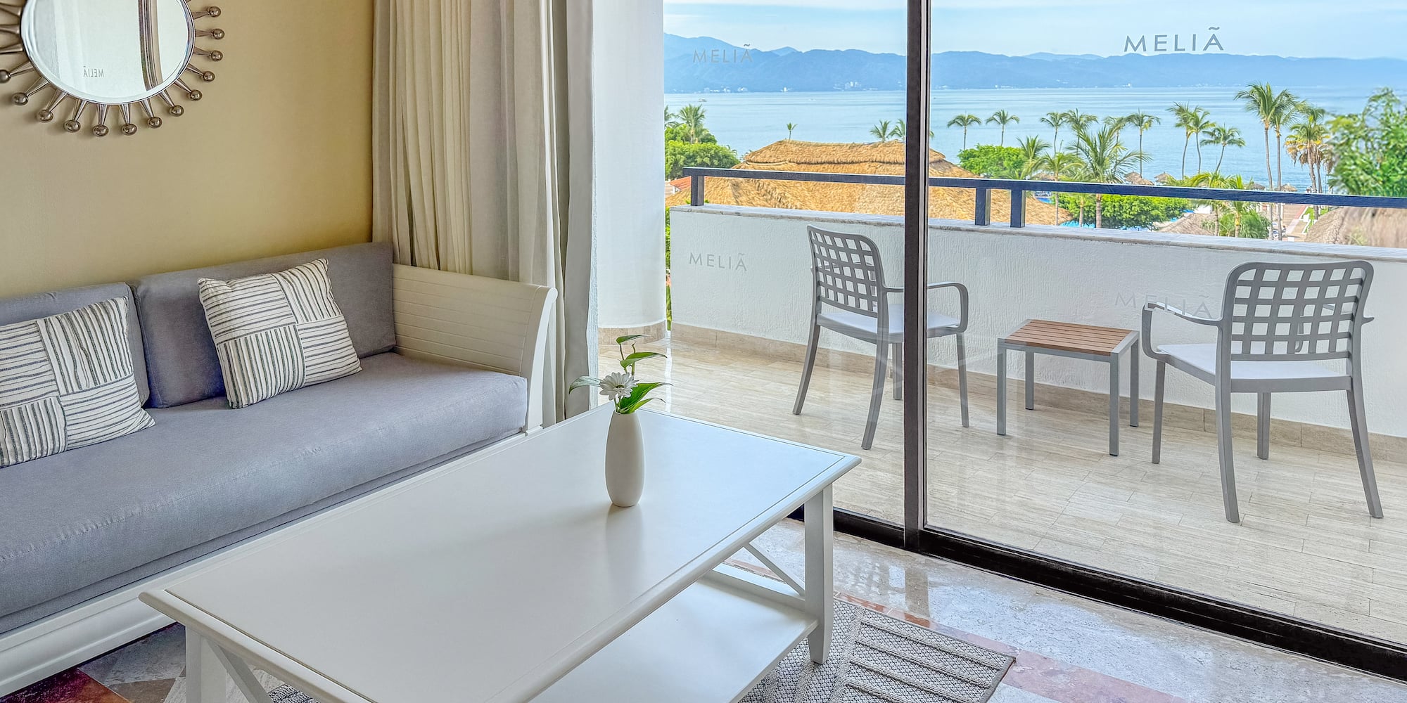 a living room with a couch and a table