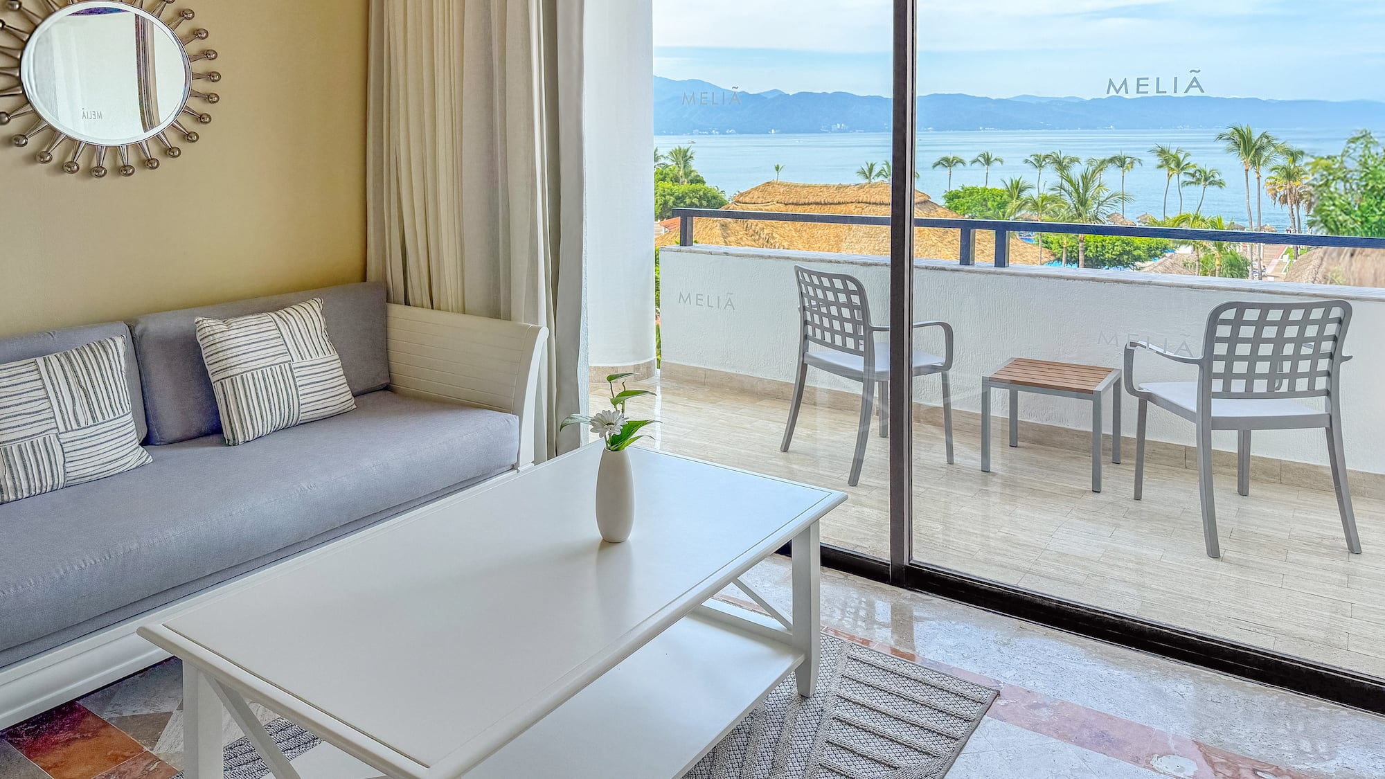 a living room with a couch and a table