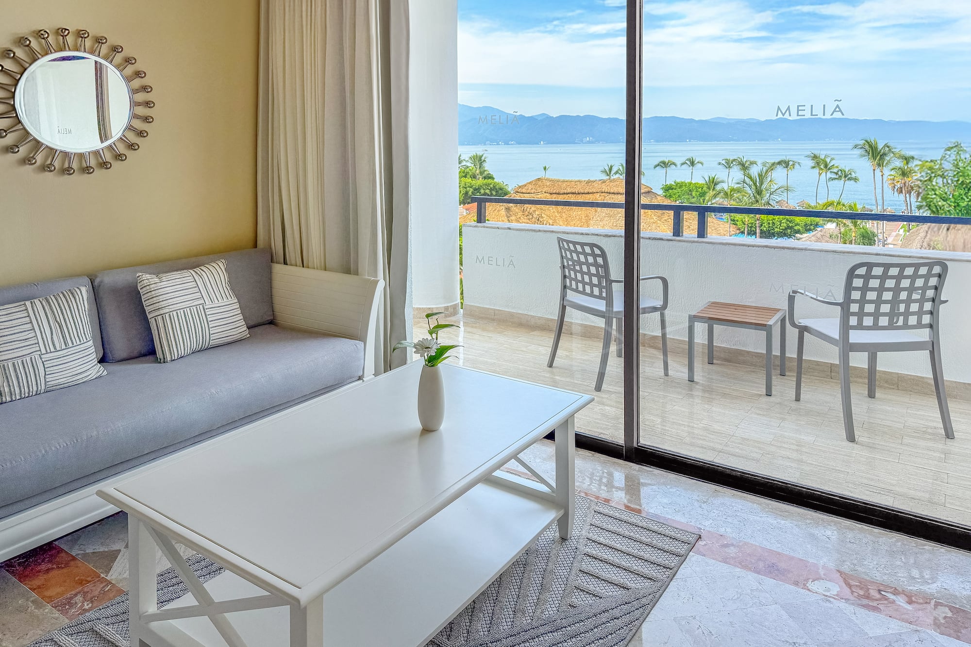 a living room with a couch and a table