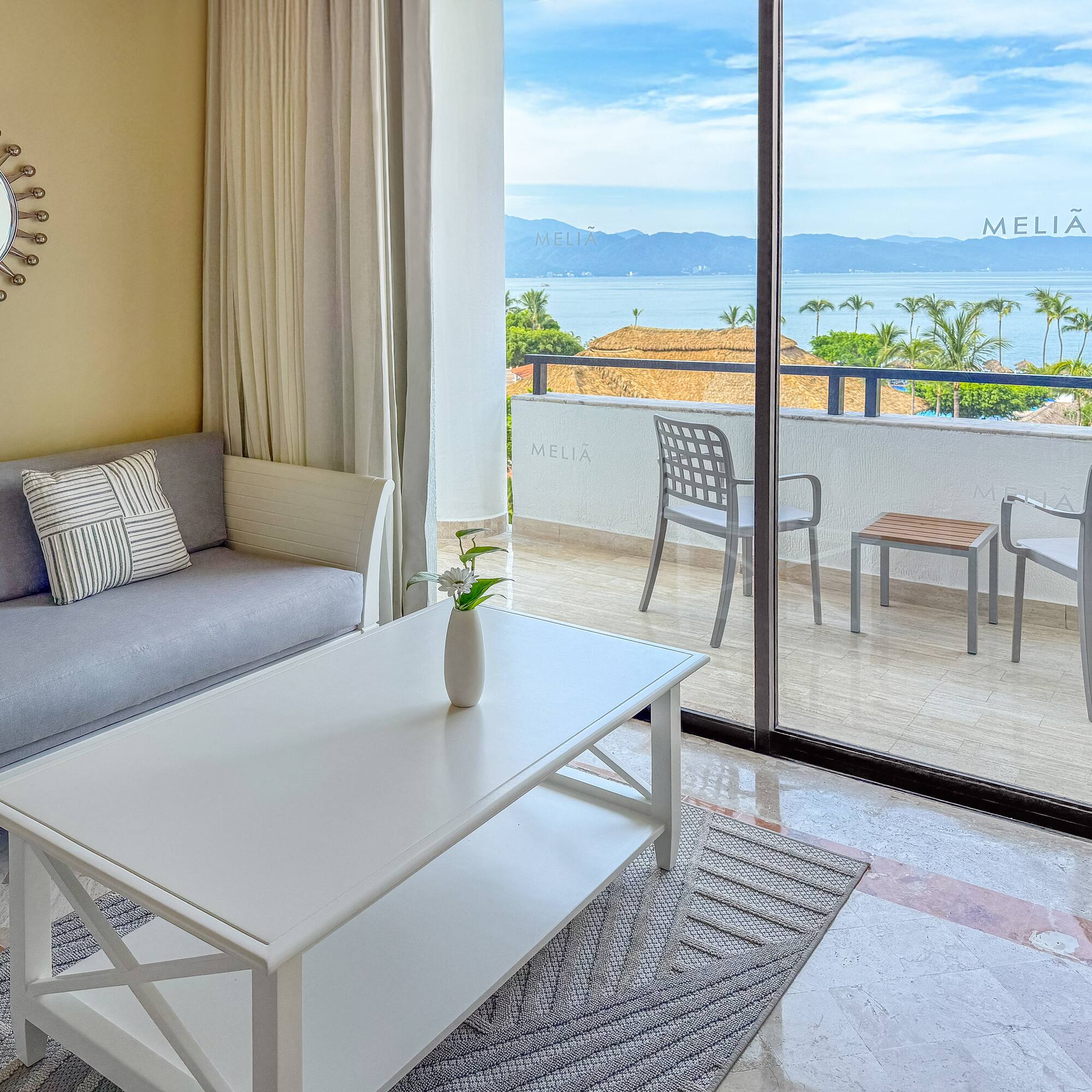 a living room with a couch and a table