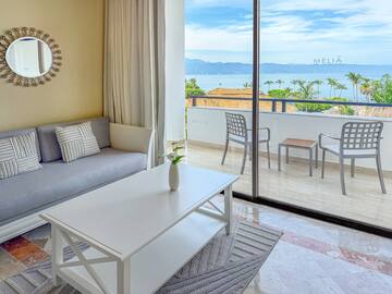 a living room with a couch and a table