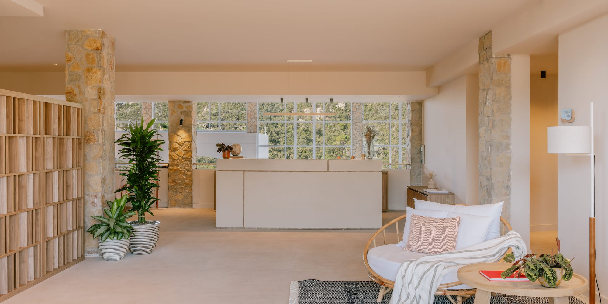 a room with a white couch and a table