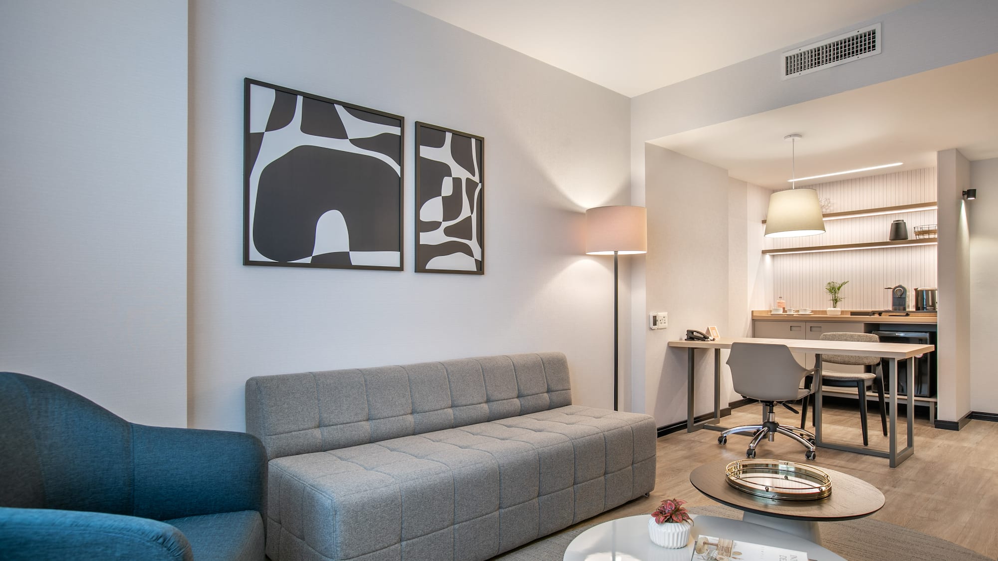 a living room with a couch and a table