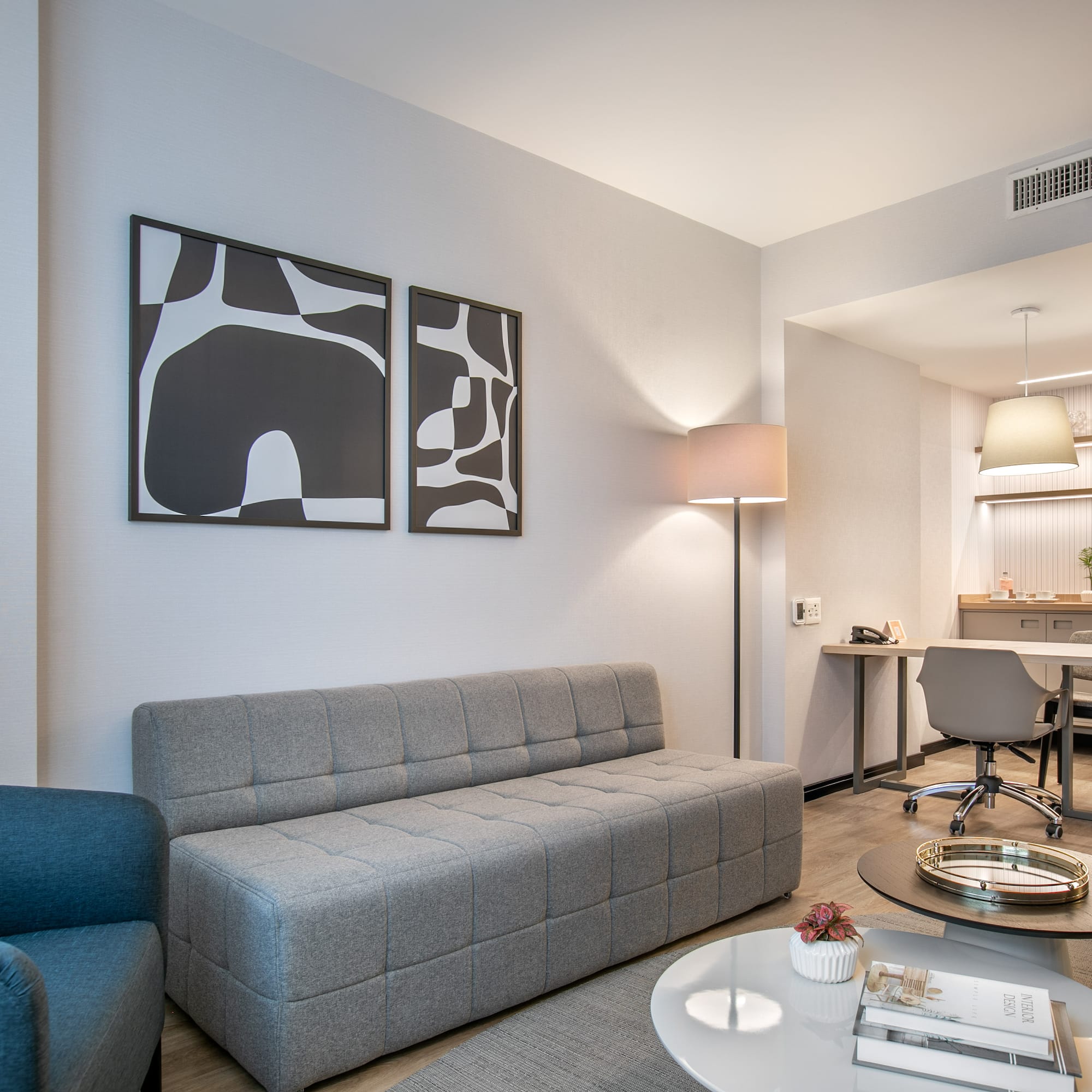 a living room with a couch and a table