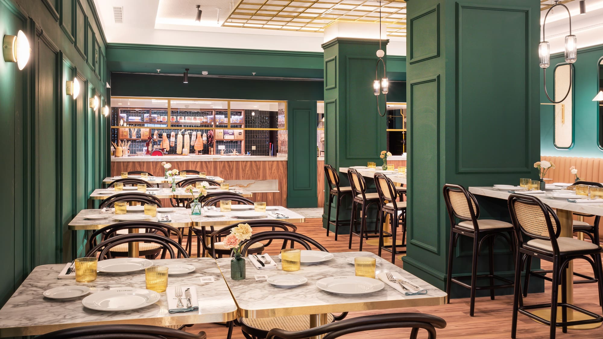 a restaurant with tables and chairs