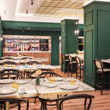 a restaurant with tables and chairs