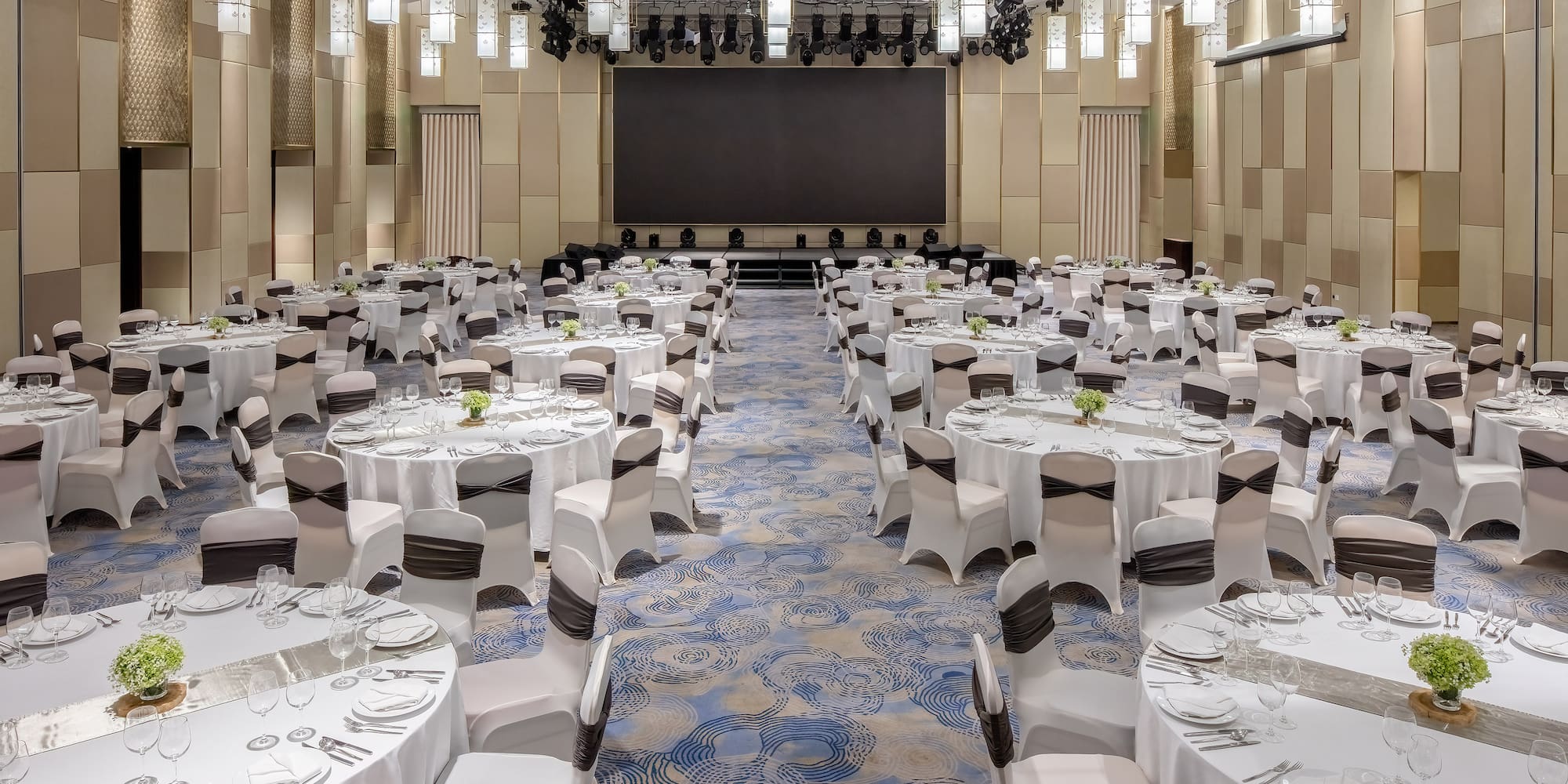 a large room with tables and chairs