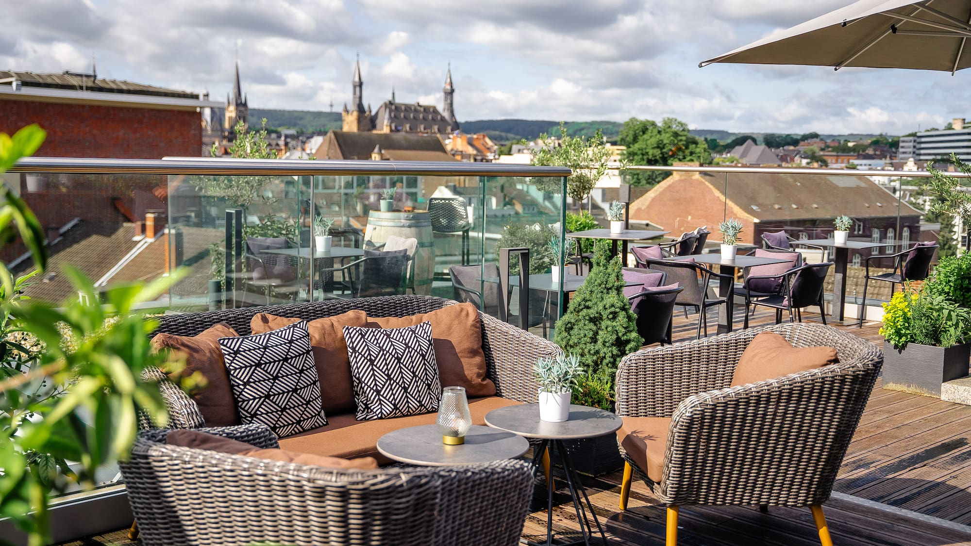 a patio with a table and chairs