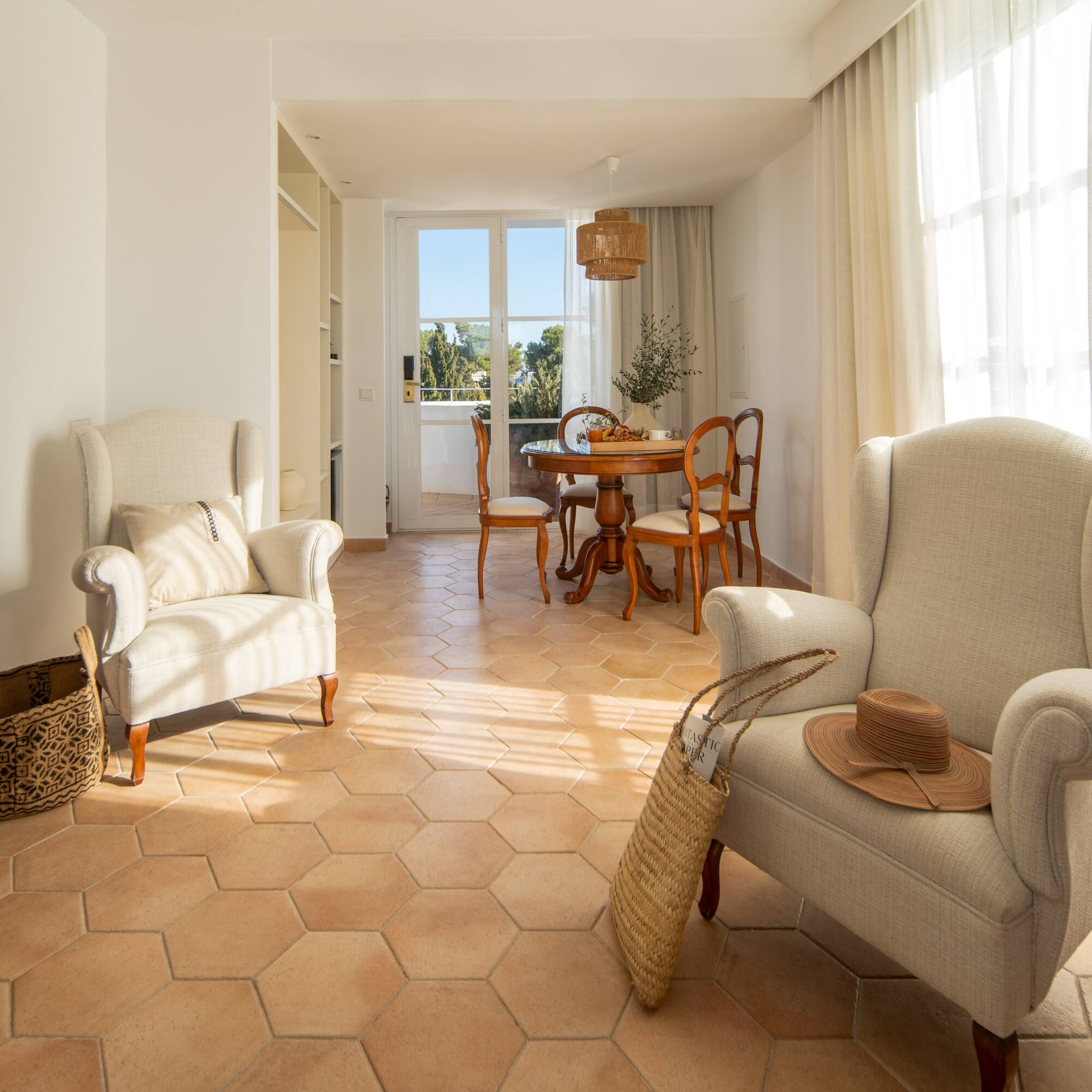 a room with chairs and a table