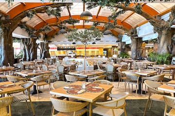 a large room with tables and chairs