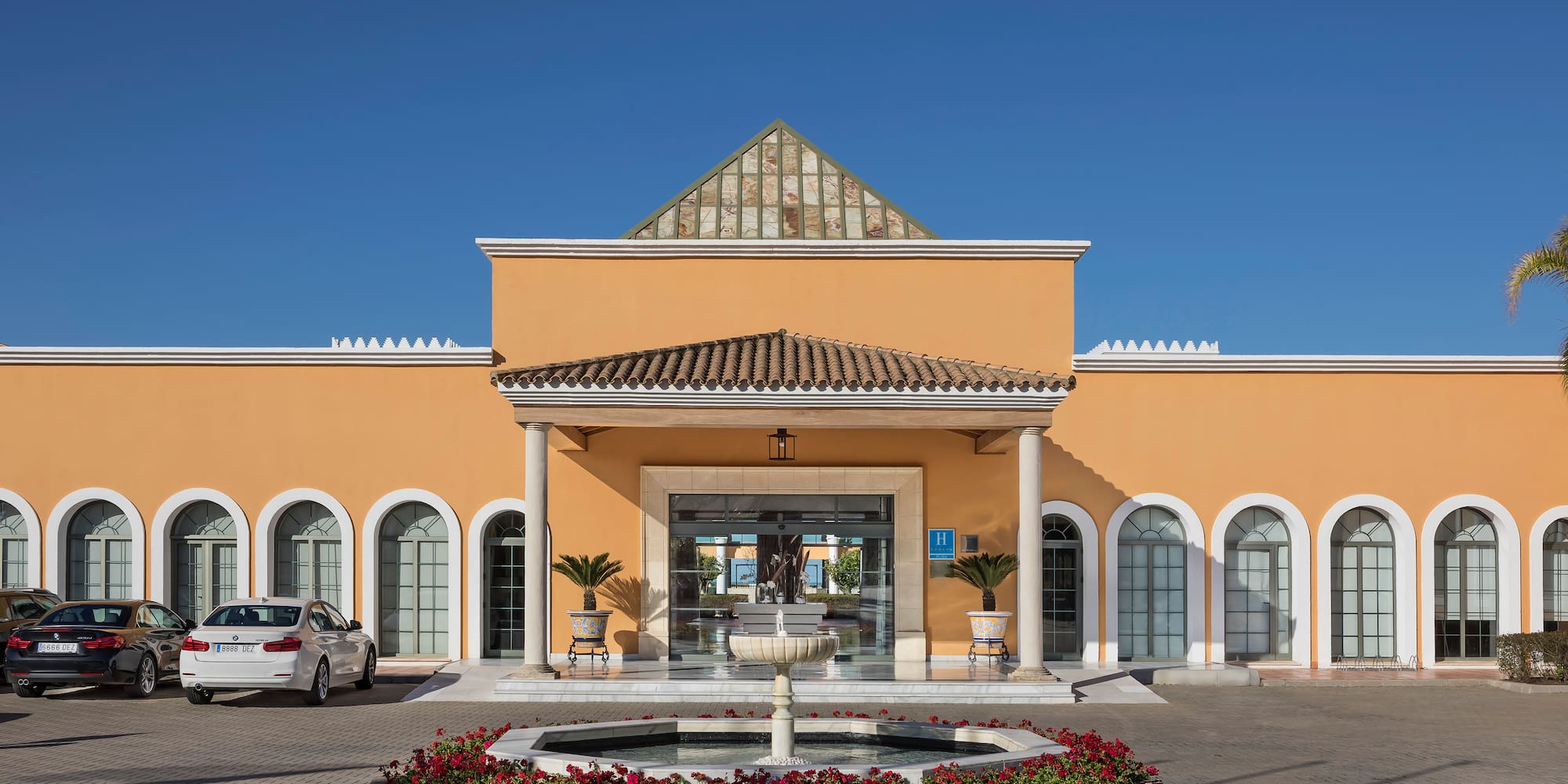 a building with a fountain in front of it