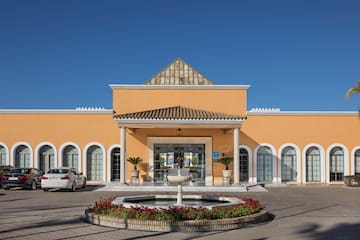 a building with a fountain in front of it
